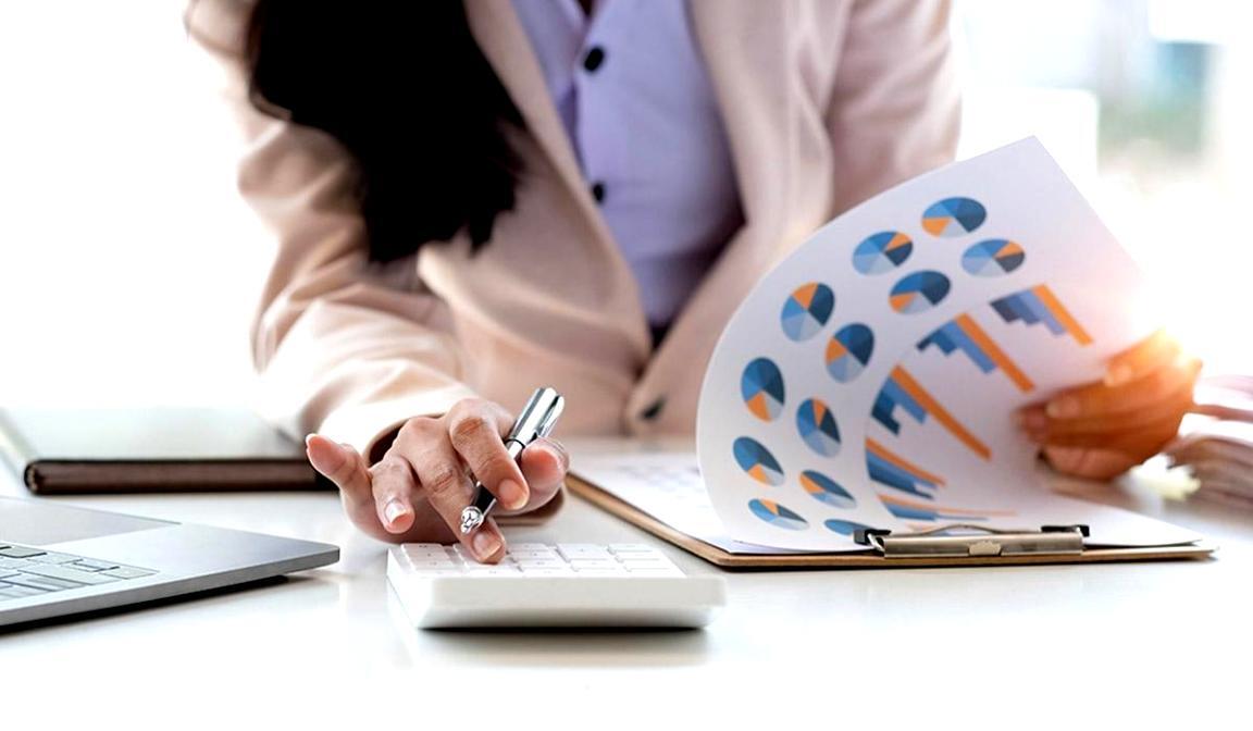 Student working through course materials on laptop